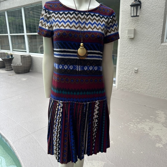 Eye catching dress with pleated bottom. - Picture 1 of 5